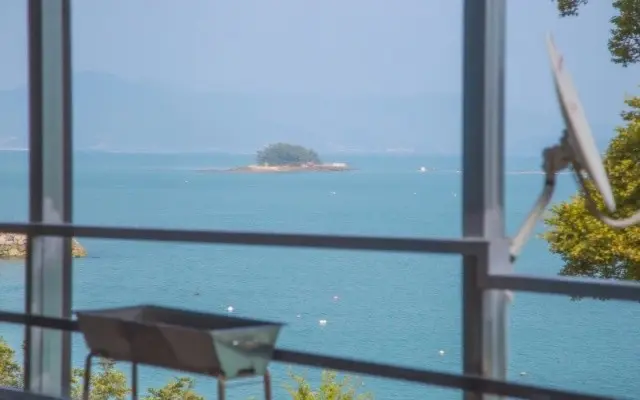 Yeosu, Jeollanam-do ocean view & seaside & walkable Rental cottage 1BR & sleeps 5 Ocean view duplex one-room unit 105 with a view of the South Sea at Baekya Island Cover Photo