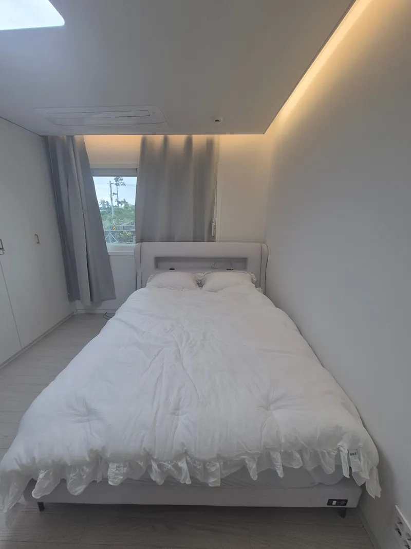 [Hangyeong, Jeju] A newly built two-room stone house with a stone wall and lawn in a quiet countryside near the sea. 2
