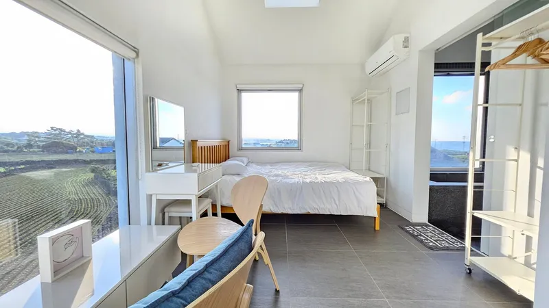 [Gujwa, Jeju] A detached house with a beautiful view of the sea, stone walls, and fields, 30 seconds from the entrance to the complex. 6
